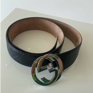 Men’s Gucci belt 10/10 size 30-34..